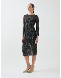 Woman wearing a black lace dress on a white background
