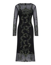 Black dress with intricate green embroidery on a white background