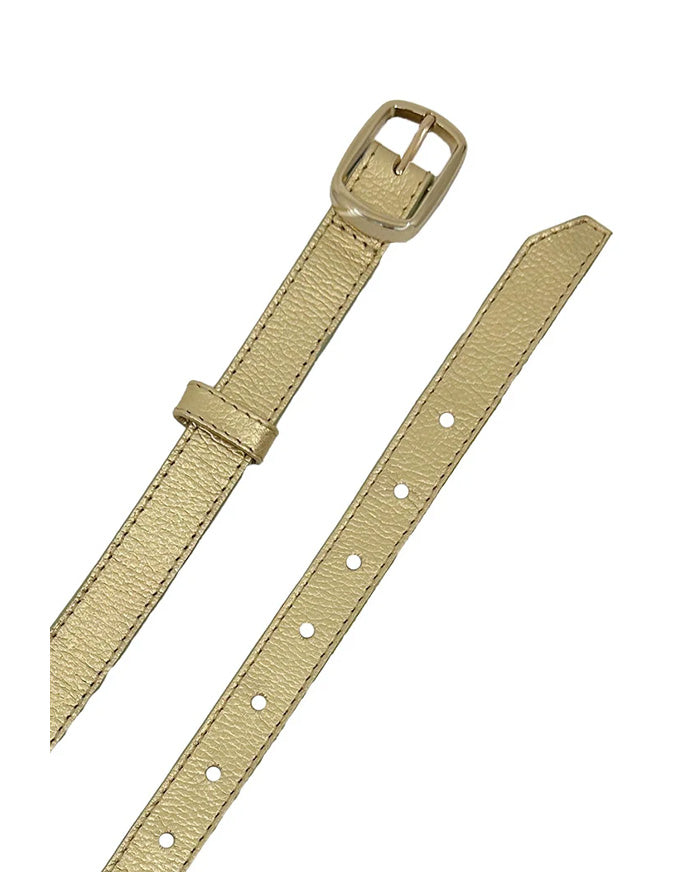 Beige watch strap with buckle on a white background