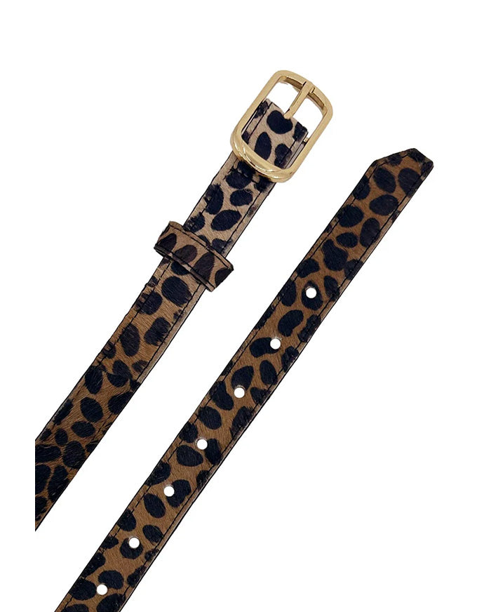Leopard print belt with gold buckle on a white background