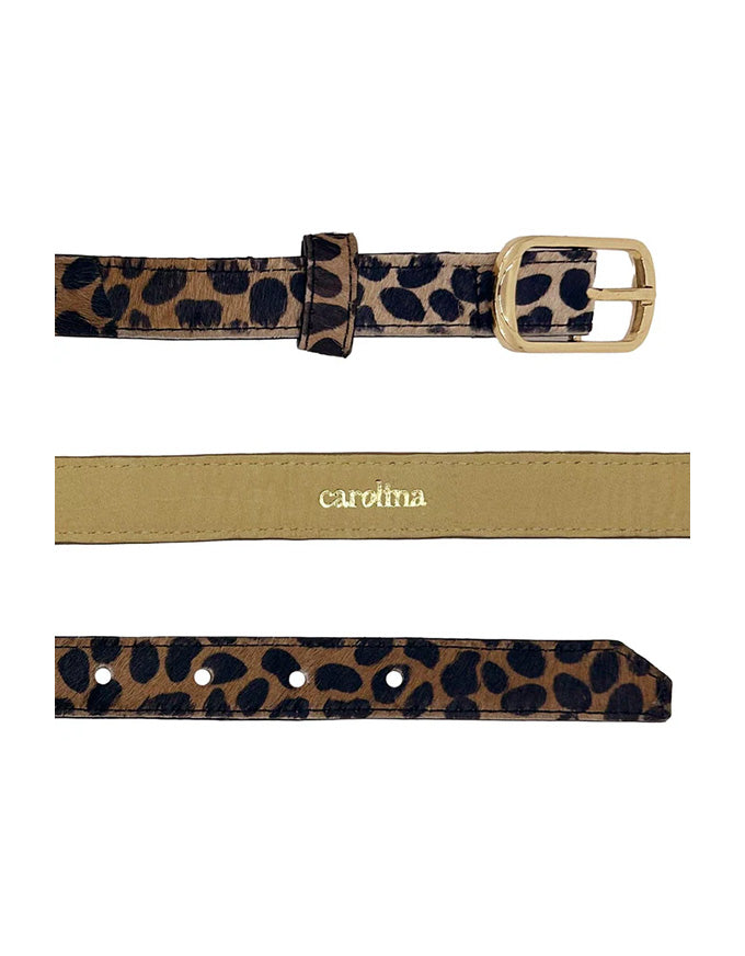 Leopard print belt with gold buckle on a white background