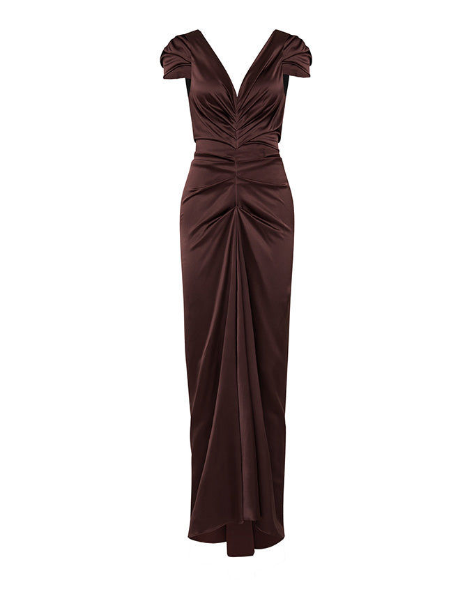 A floor-length dark brown satin gown with a deep V-neckline, cap sleeves, and dramatic gathered draping details on the bodice and skirt, shown against a plain white background.