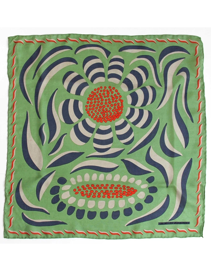 Square scarf with a floral pattern on a green background