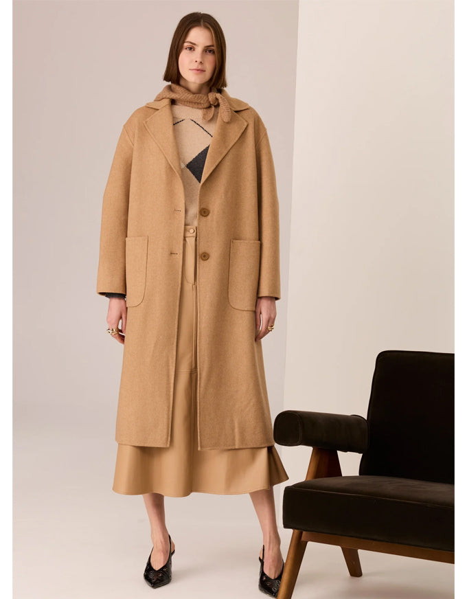 POL Cohen long wool coat in camel with notched lapel and patch pockets, worn on model