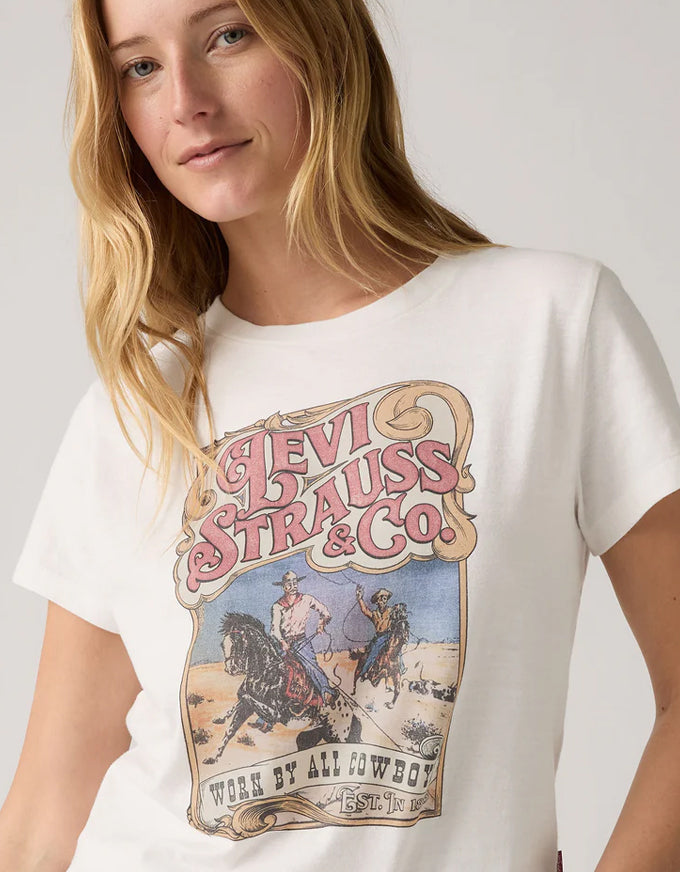 Woman wearing a white t-shirt with Levi Strauss & Co. graphic design. Graphic Boxy TShirt Western Archival