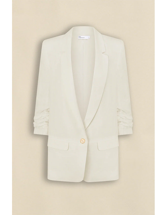 Light beige blazer on a beige background