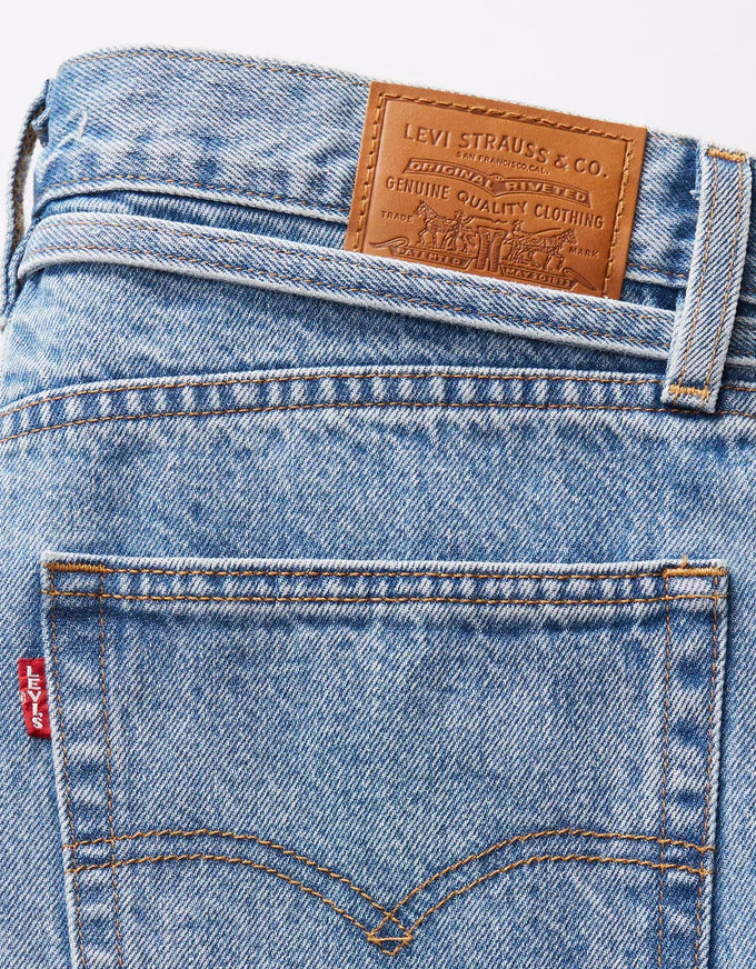Close-up of Levi's jeans with brand label and logo. XL Straight Jeans - Thanks Friend