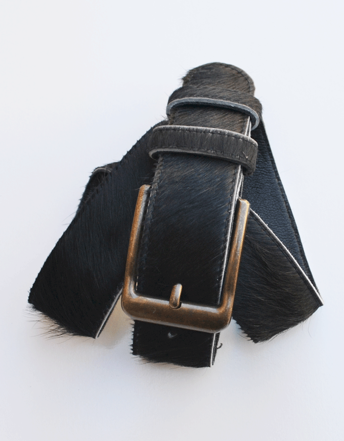 A premium cowhide belt, with a classic brass buckle.