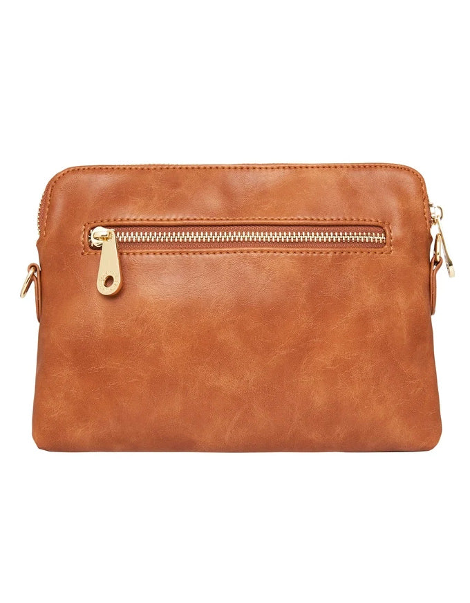 The Bowery Wallet is so much more than just a wallet! With its detachable and adjustable strap, this piece can be used as a clutch, shoulder bag or cross body bag!