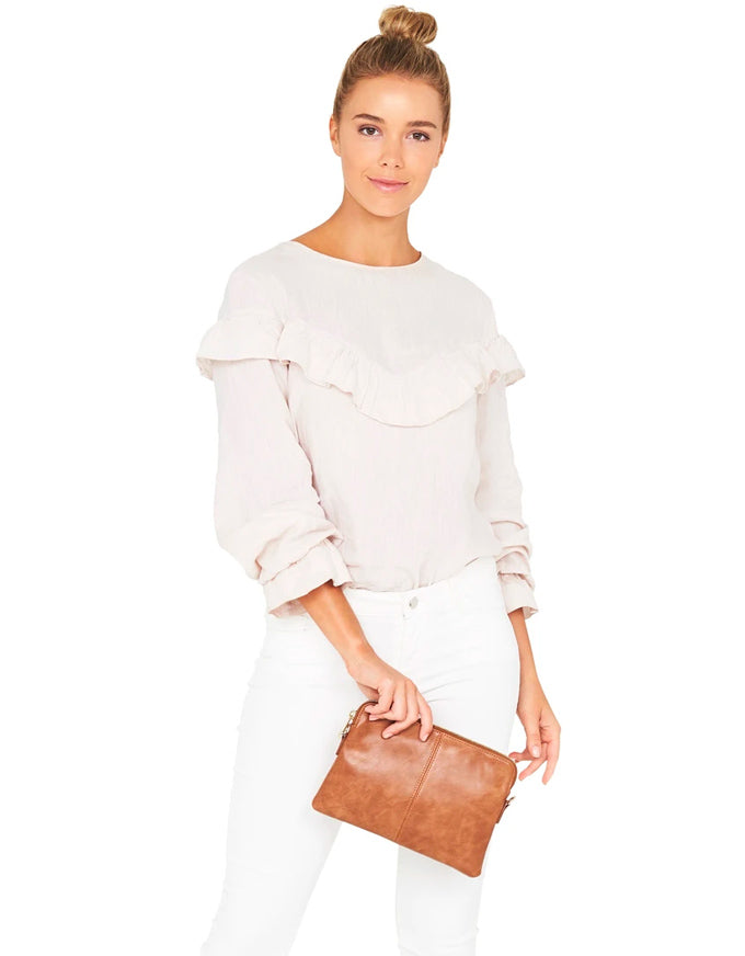The Bowery Wallet is so much more than just a wallet! With its detachable and adjustable strap, this piece can be used as a clutch, shoulder bag or cross body bag!