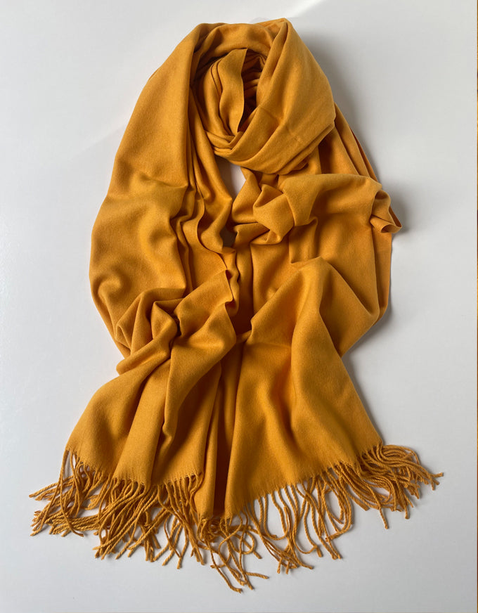The Cashmere Scarf in Mustard.