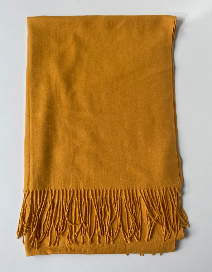 The Cashmere Scarf in Mustard.