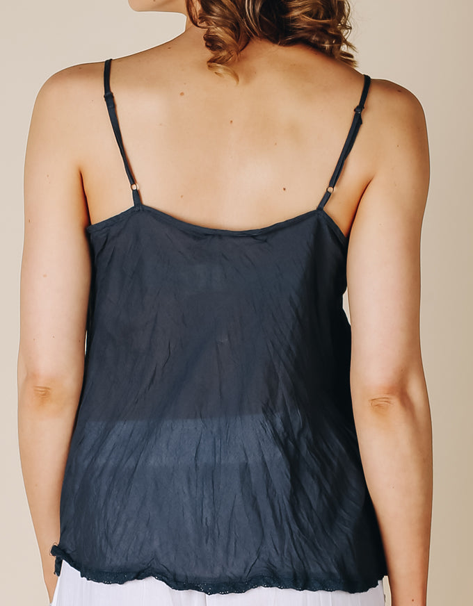 The perfect basic cami to layer under any sheer top.