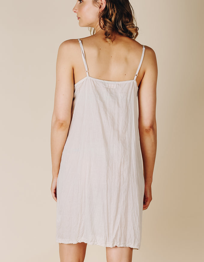 The perfect basic slip to layer under any sheer dress.