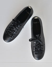 The Orphic Black Leather Sneakers.