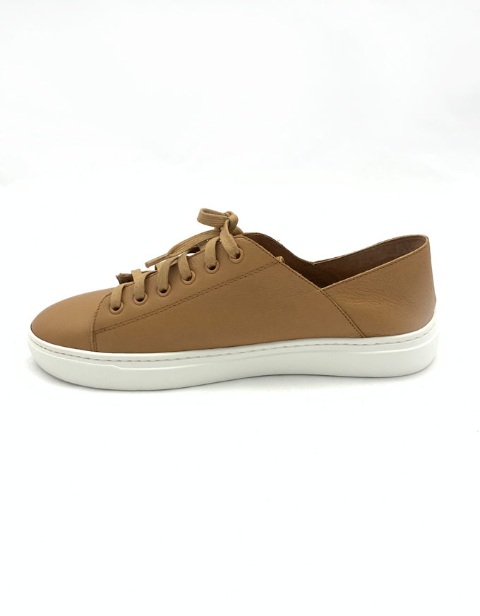 The Oskher Sneakers in Tan Leather.  Lend an on-trend feel to casual looks with this chic pair from Mollini.  Based on a sporty sneaker sole, Oskher is crafted from soft leather, with a lace-up front panel for convenience.